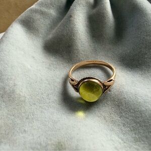 Antique 14 carat rose gold ring with cabochon peridot stone